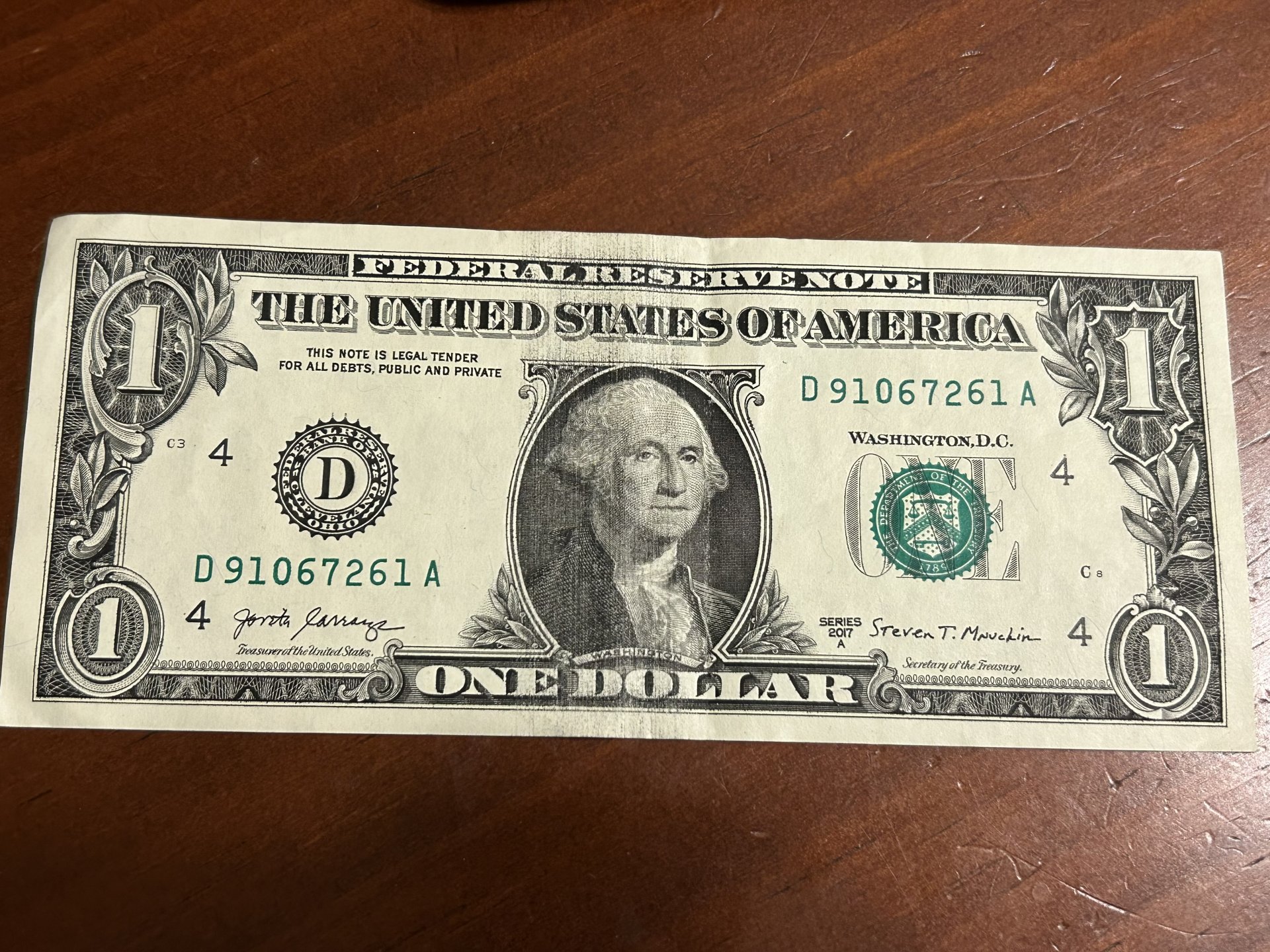 Possible ink smear One dollar bill
