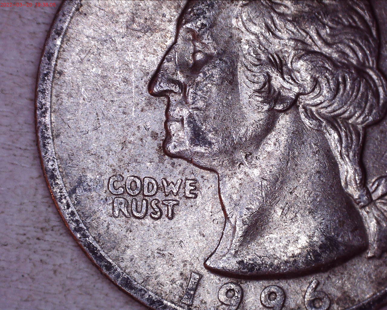 in god we rust 1996 quarter close up.jpg