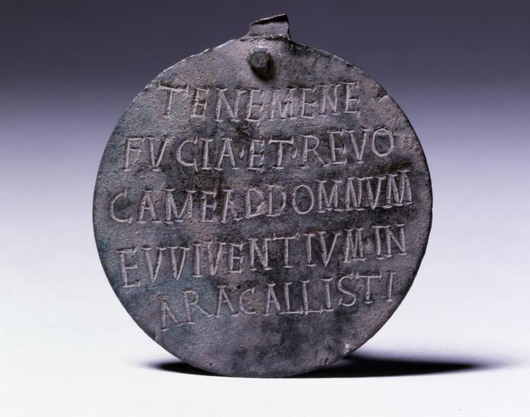 Inscribed plate and slavery tag found in Rome (1).jpg