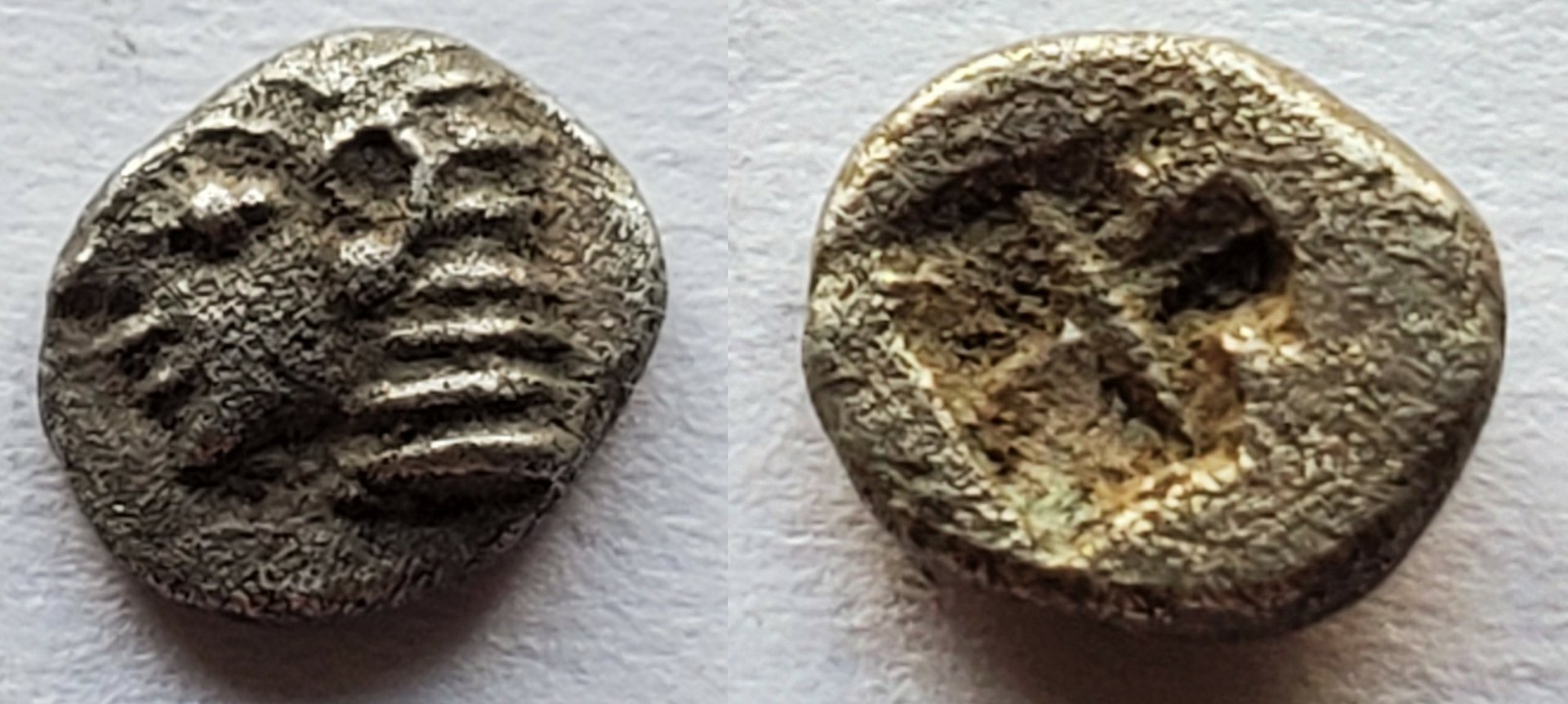 Ionia Kolophon tetartemorion archaic head.jpg