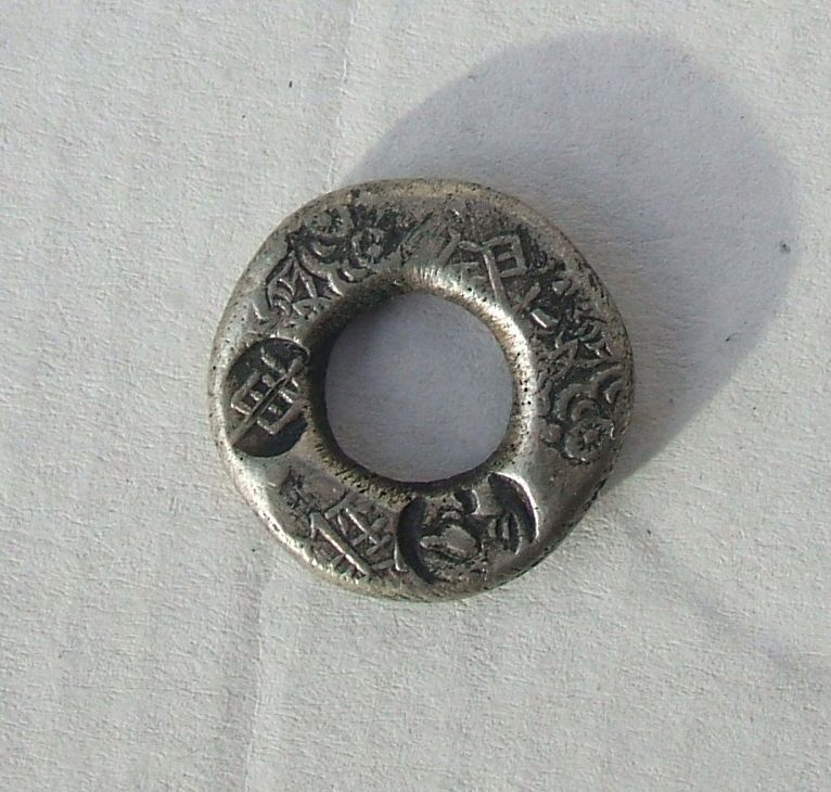 Japanese doughnut silver coin 11.jpg