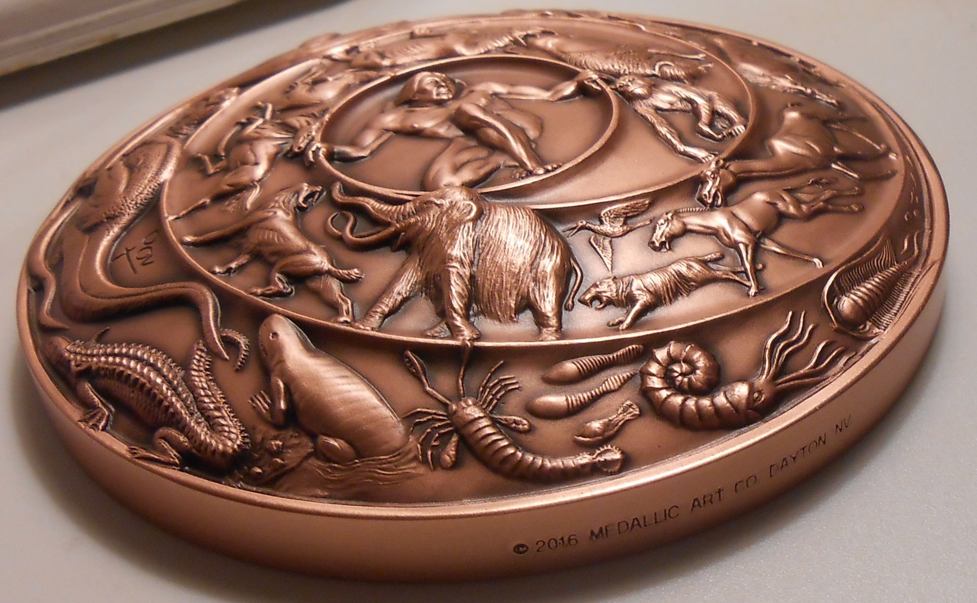 Jovine creation medal edgestamp2.jpg