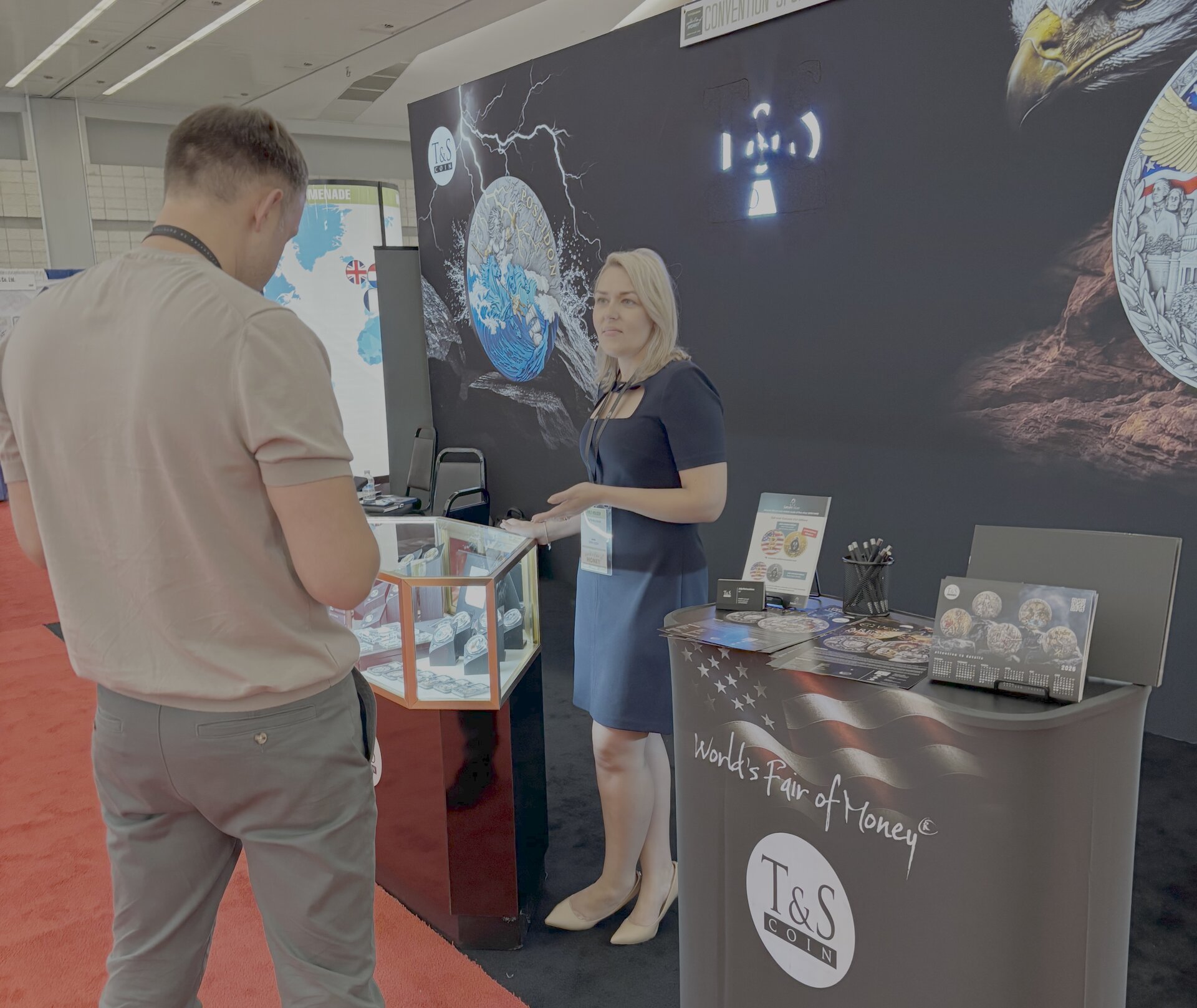 Julija greets a customer at T&S Coins of Vilnius.jpg