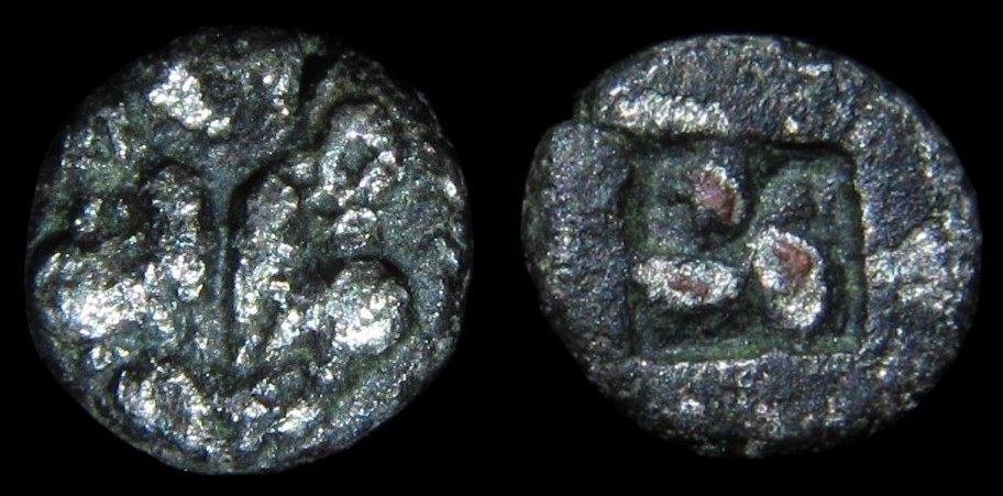 Lesbos - Confronting boar heads c.500 B.C..jpg