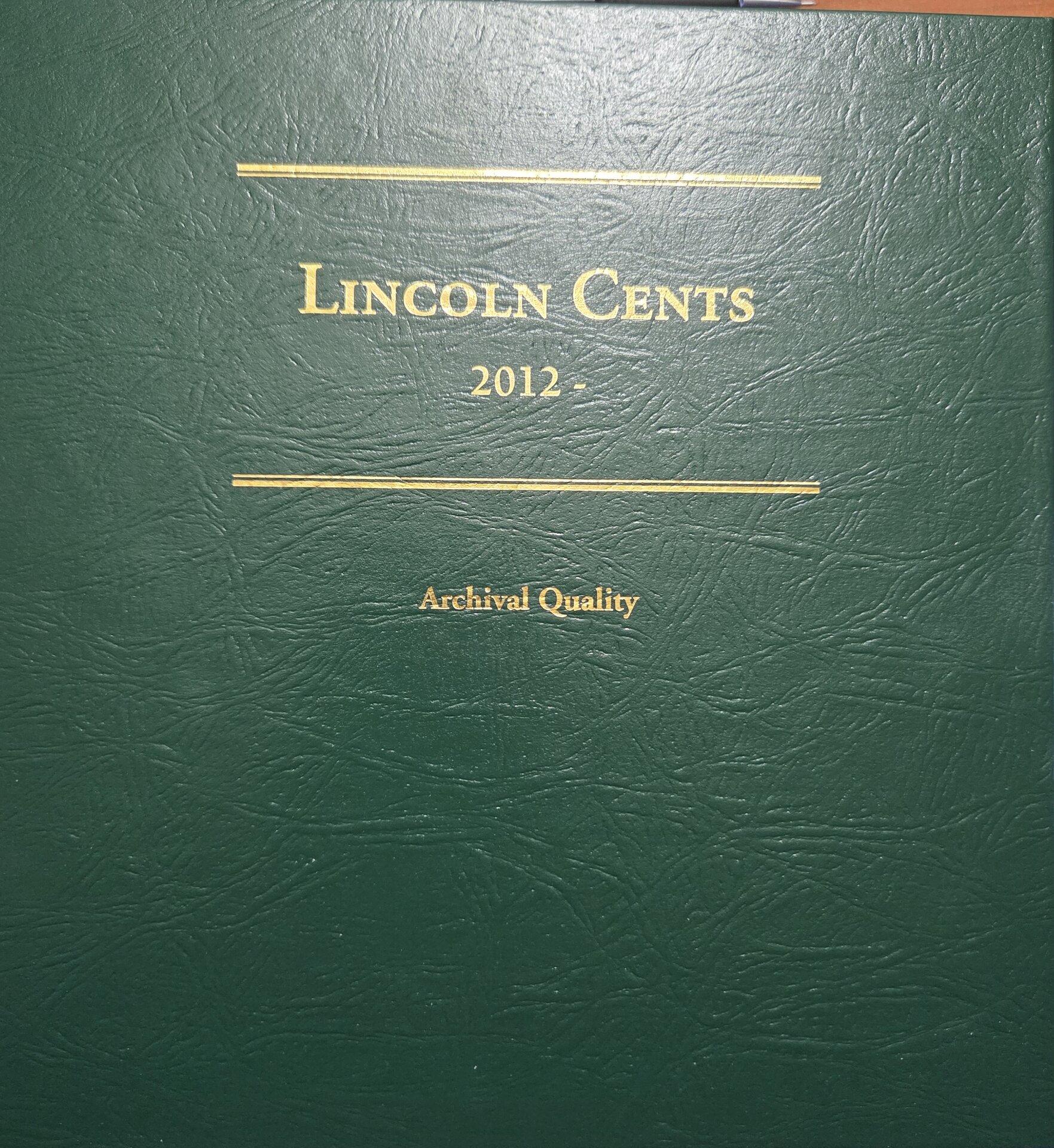 Lincoln Cents 2012- Page 1.jpg