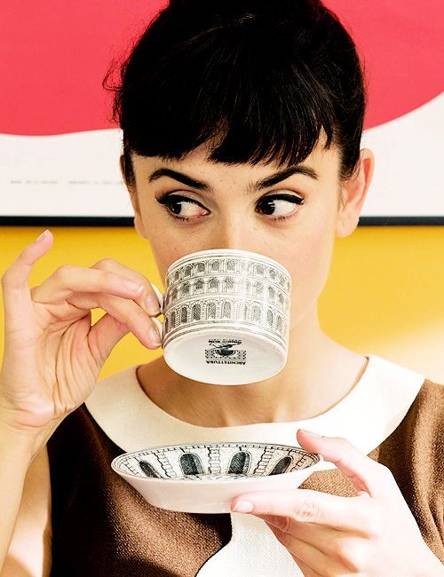 madame zuzu tea cup hold.png