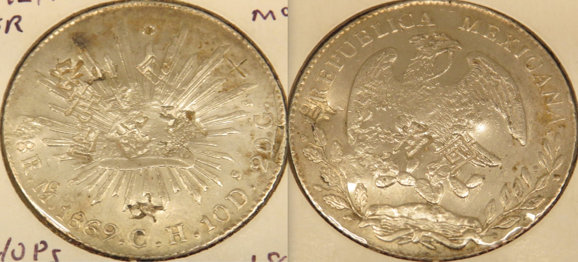 Mexico 8 Reales 1869 chops copy.jpeg