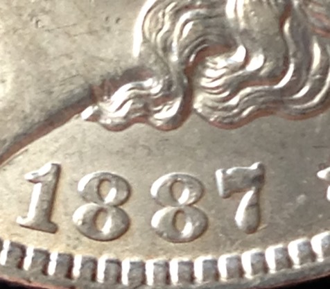 Morgan 1887 obverse close-up date.jpg