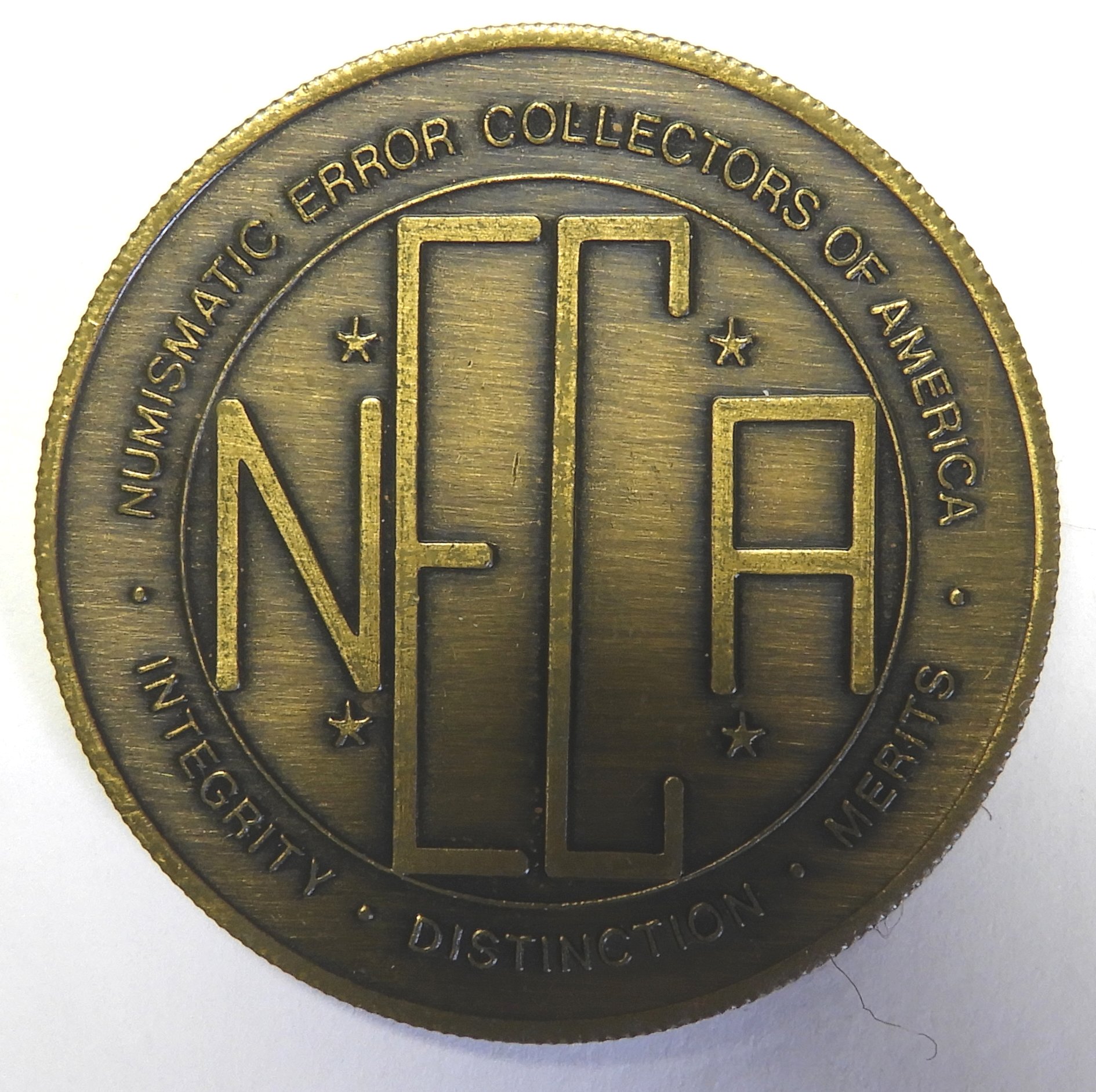 NEECA token 1.jpg