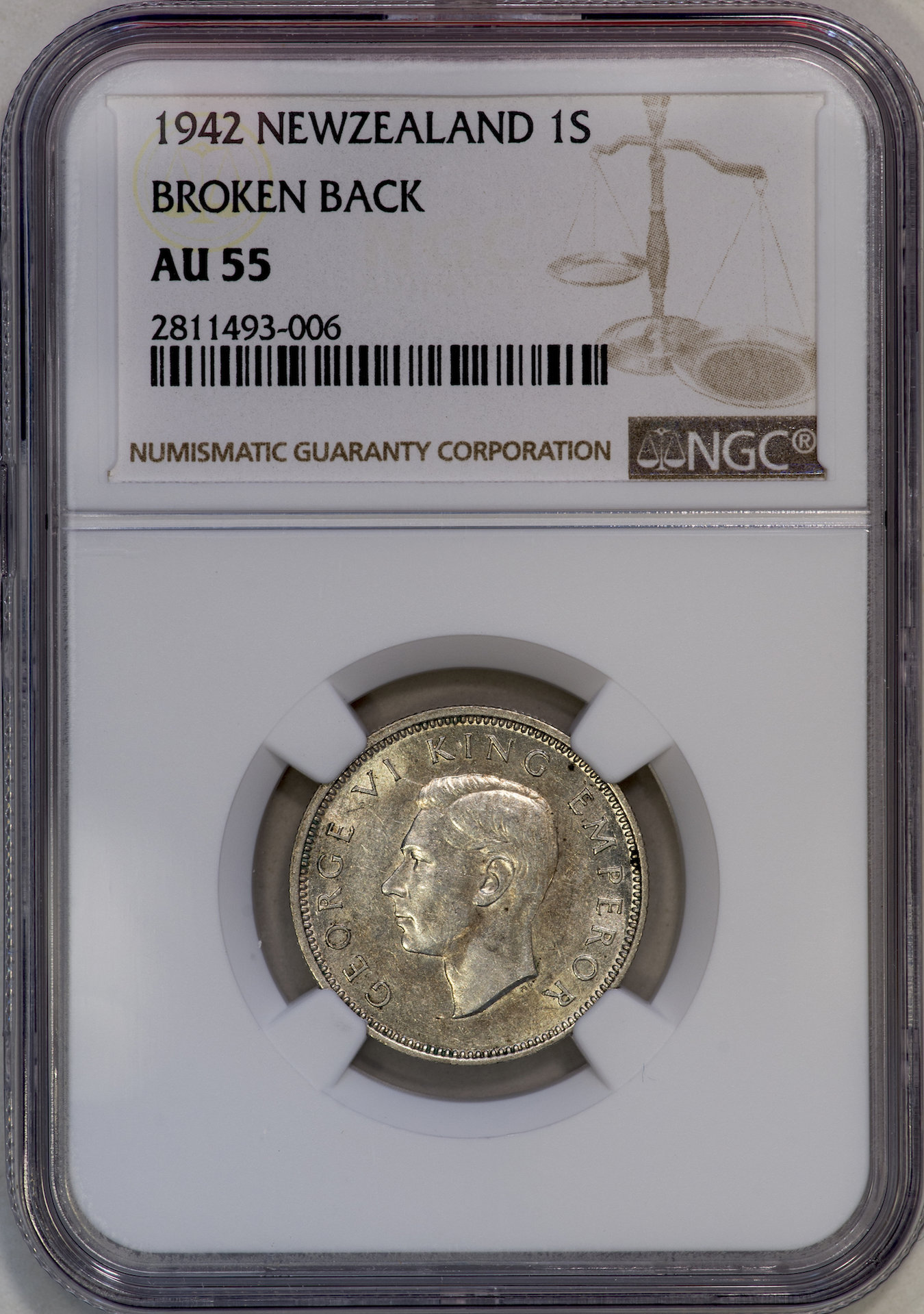 New Zealand - 1942 Broken Back Shilling NGC AU55 Slab - Obverse.jpg