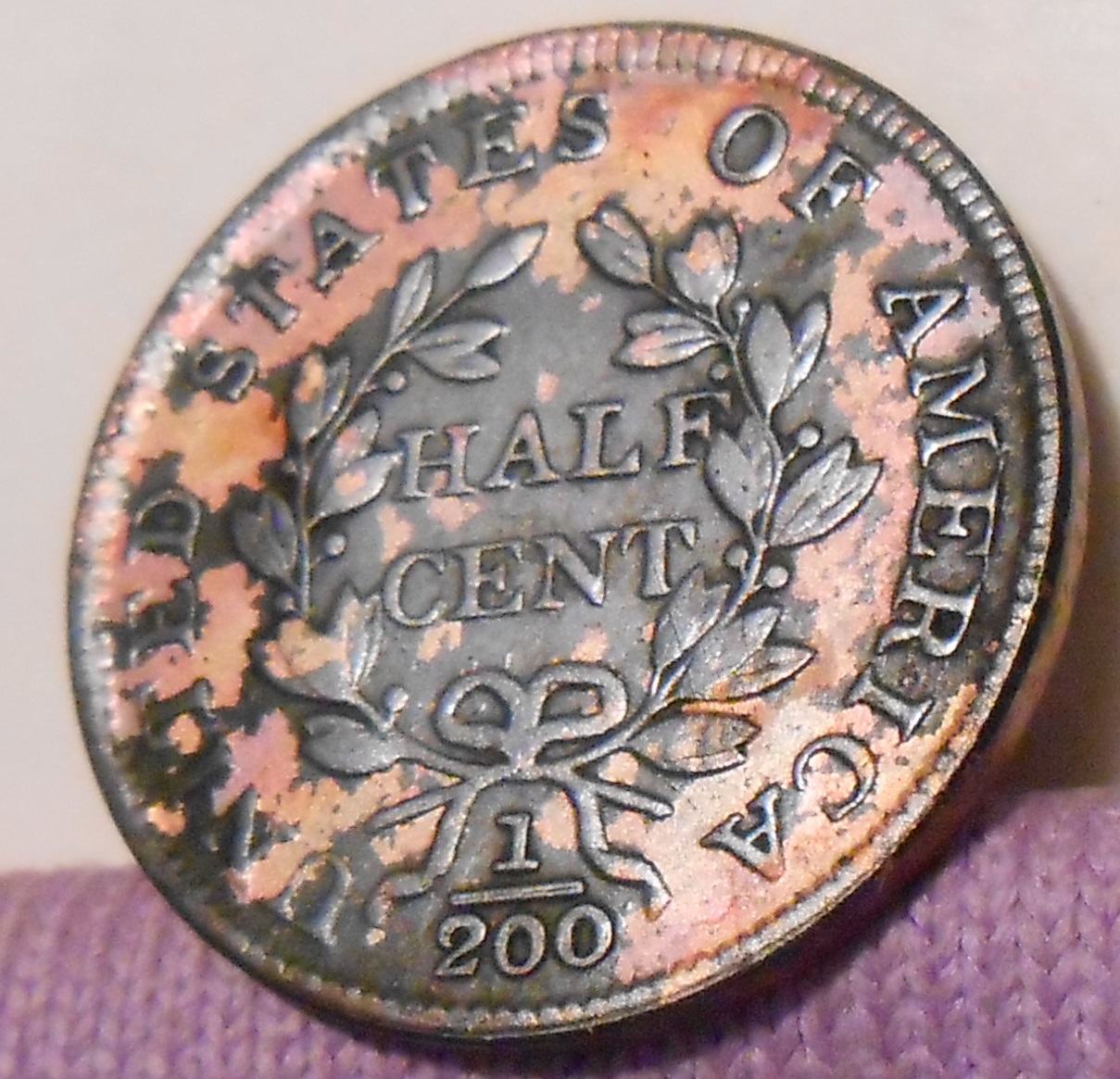 norms coin3rev.JPG