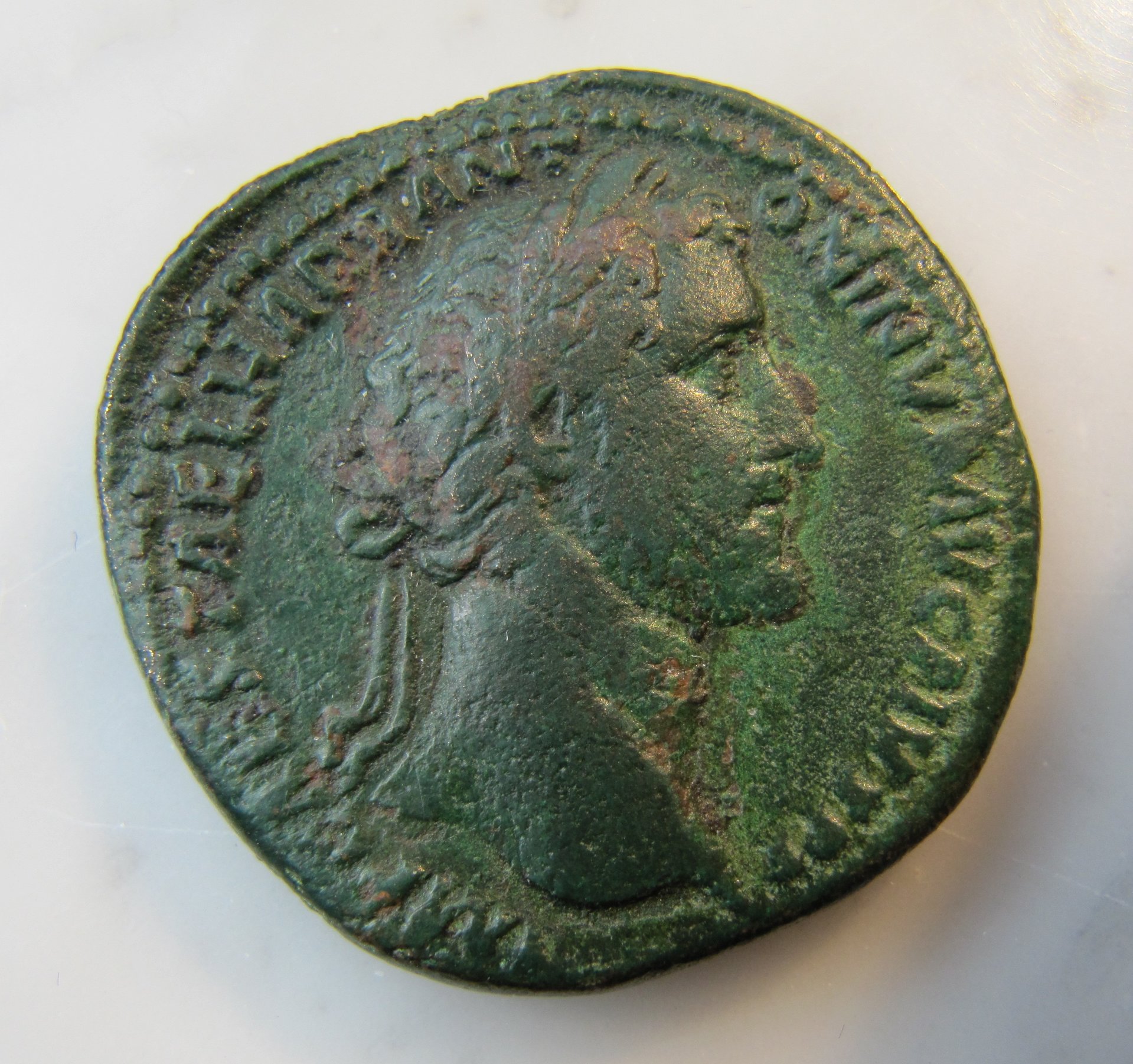 ntoninus Pius Sestertius-Pius seated victoria-Obv - 1.jpg