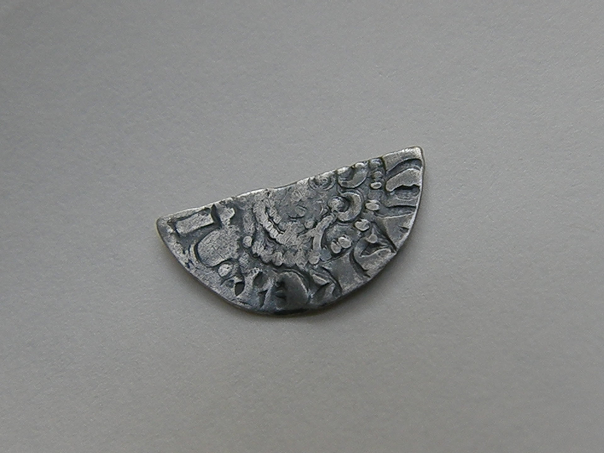 obverse of cut penny.JPG