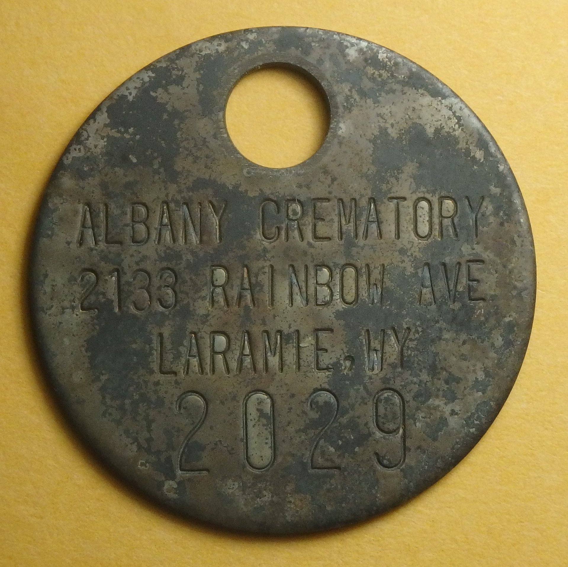 Oot cremation tag obv.JPG