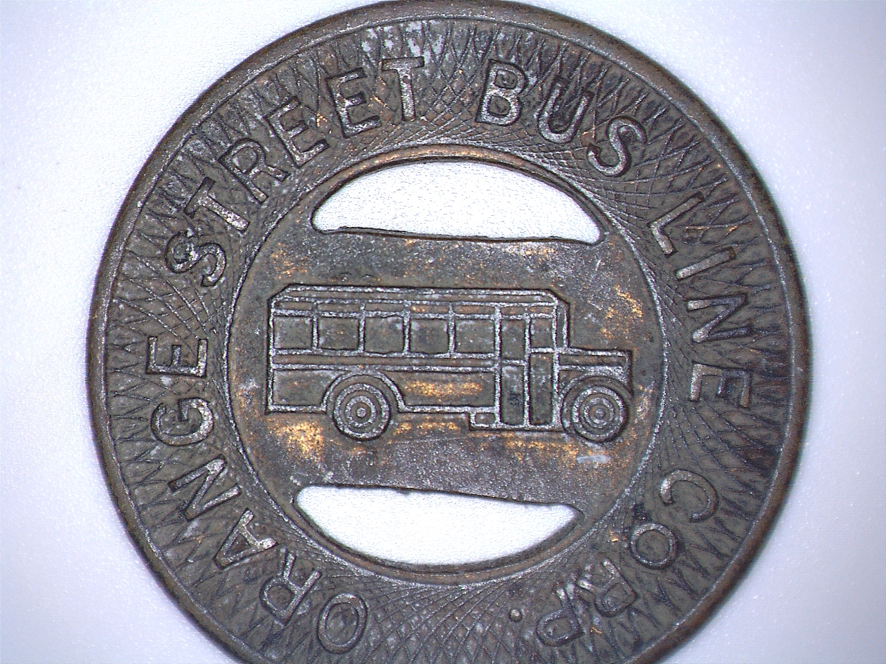Orange Street bus token. Obverse.jpg