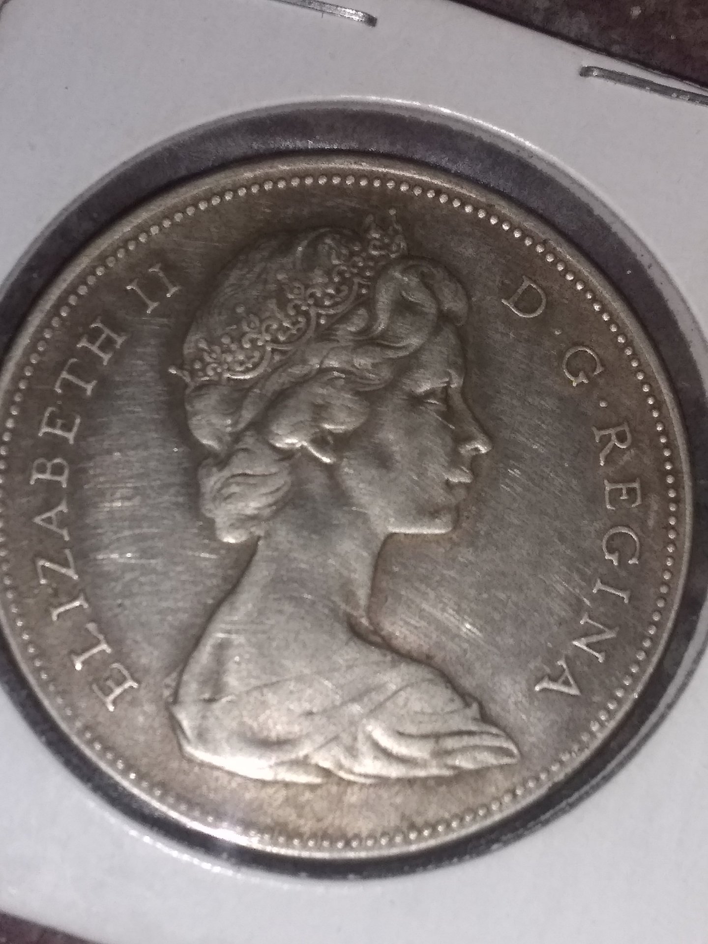 1966 Canadian one dollar coin. | Coin Talk