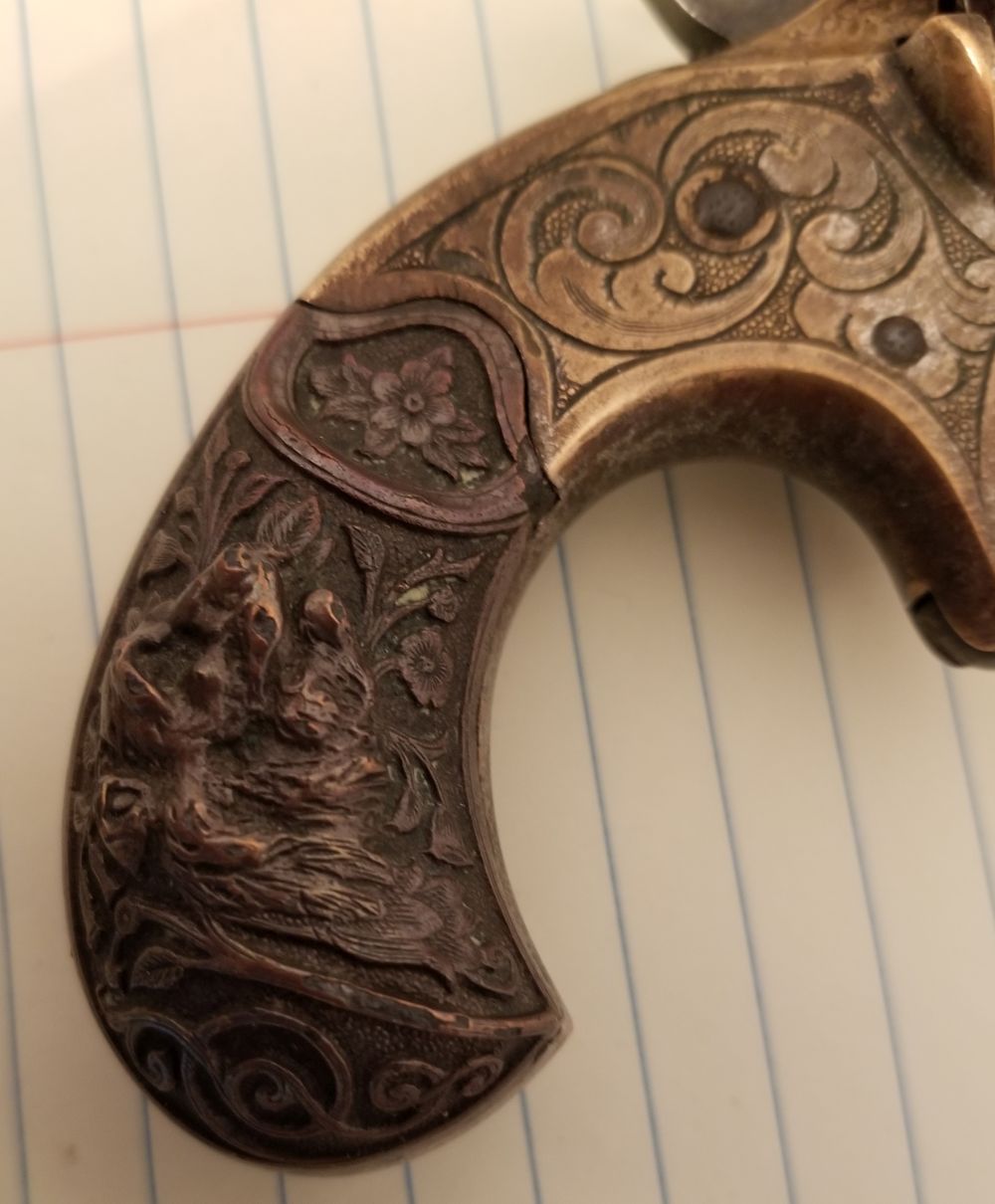 pistol 25caliber grips.jpg
