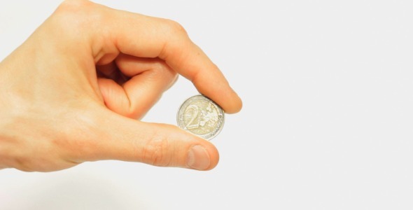 preview Male.Hand.Holding.2.Euro.Coins.jpg