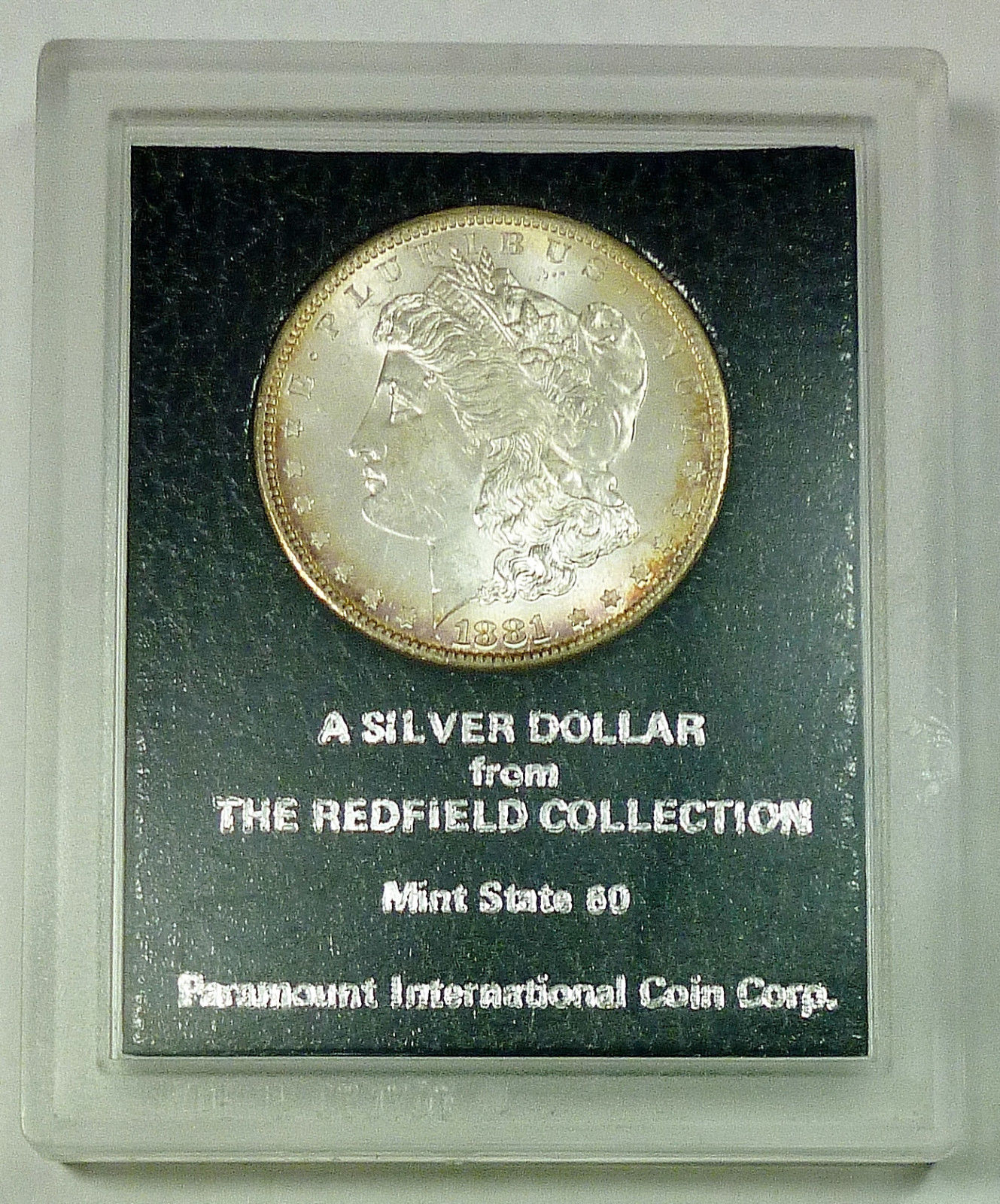 Redfield coin in Black holder.jpg