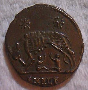 Rev - VRBS ROMA Obv - Roma, helmeted , wearing imperial cloak  Rev She Wolf, Romulus Remus.jpg