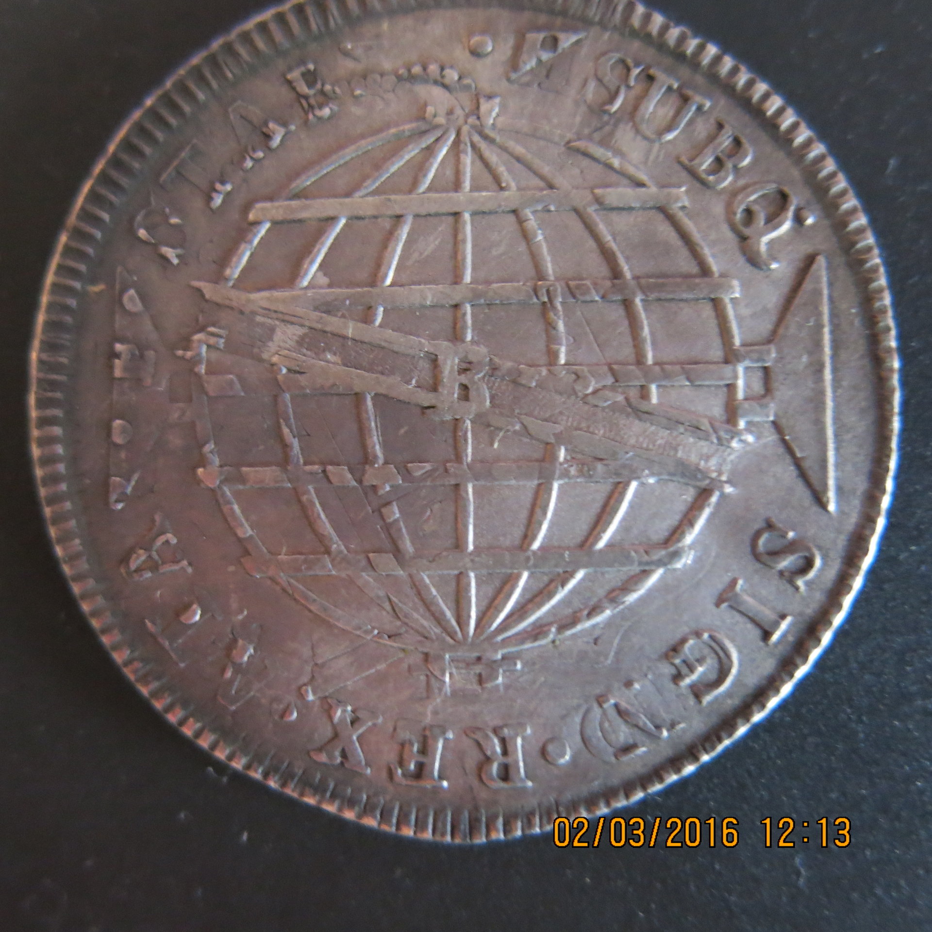 Reverse of 1815 B Overstruck on Chile 8 Reales KM 80 1813-SoFJ.JPG