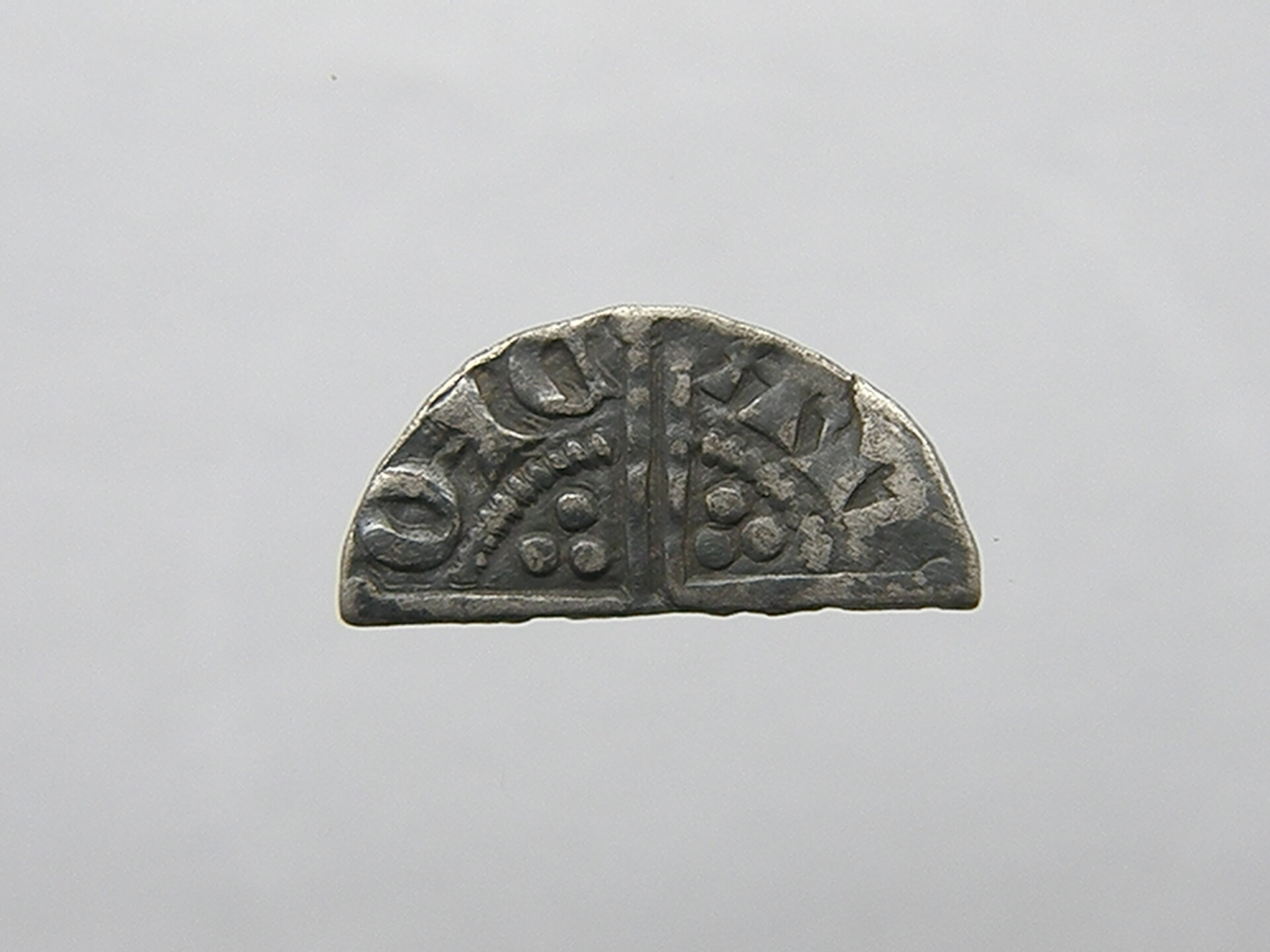 reverse of another voided penny.JPG
