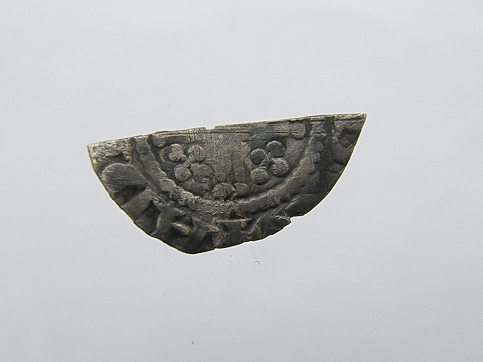 reverse of well clipped penny.JPG