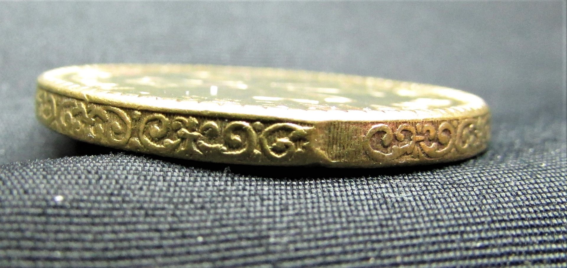 RL Renaissance Fair Token - Dragon Rider - side edge.JPG