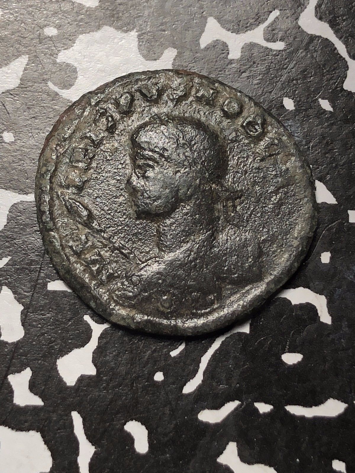 roman coin facing left-front.jpg