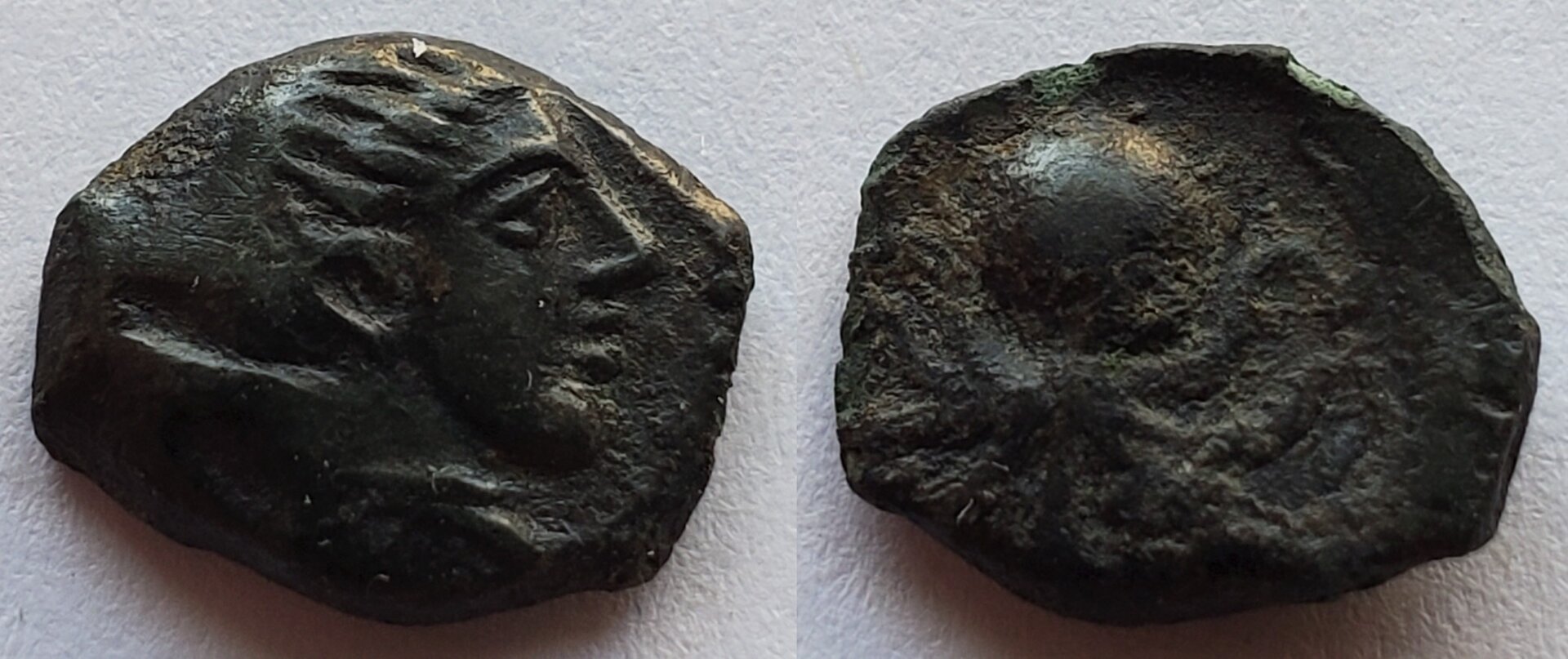 Sicily AE Onkia head right octopus 450 BC.jpg