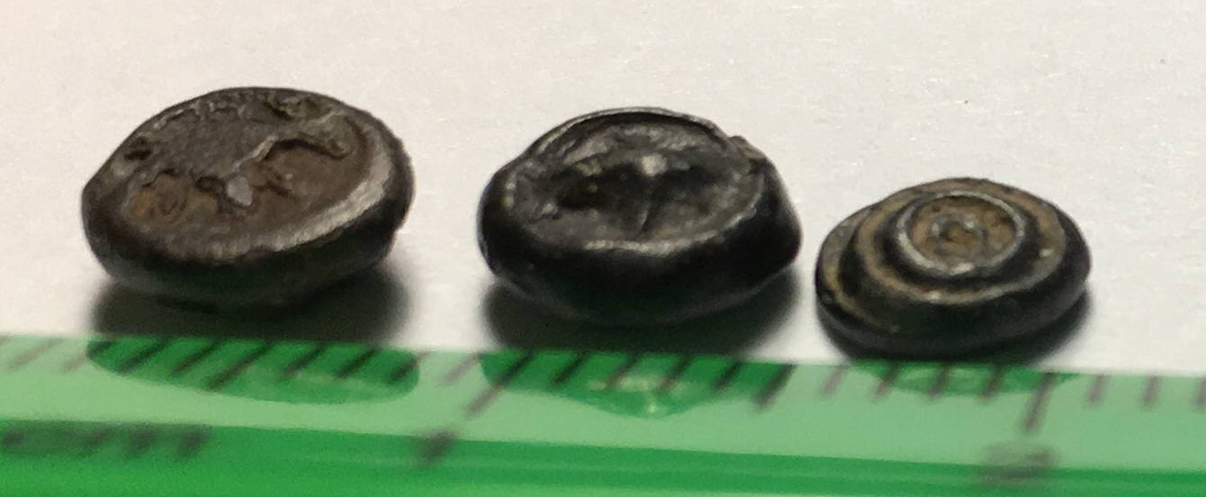 Small Srivijaya Tin Coins.png