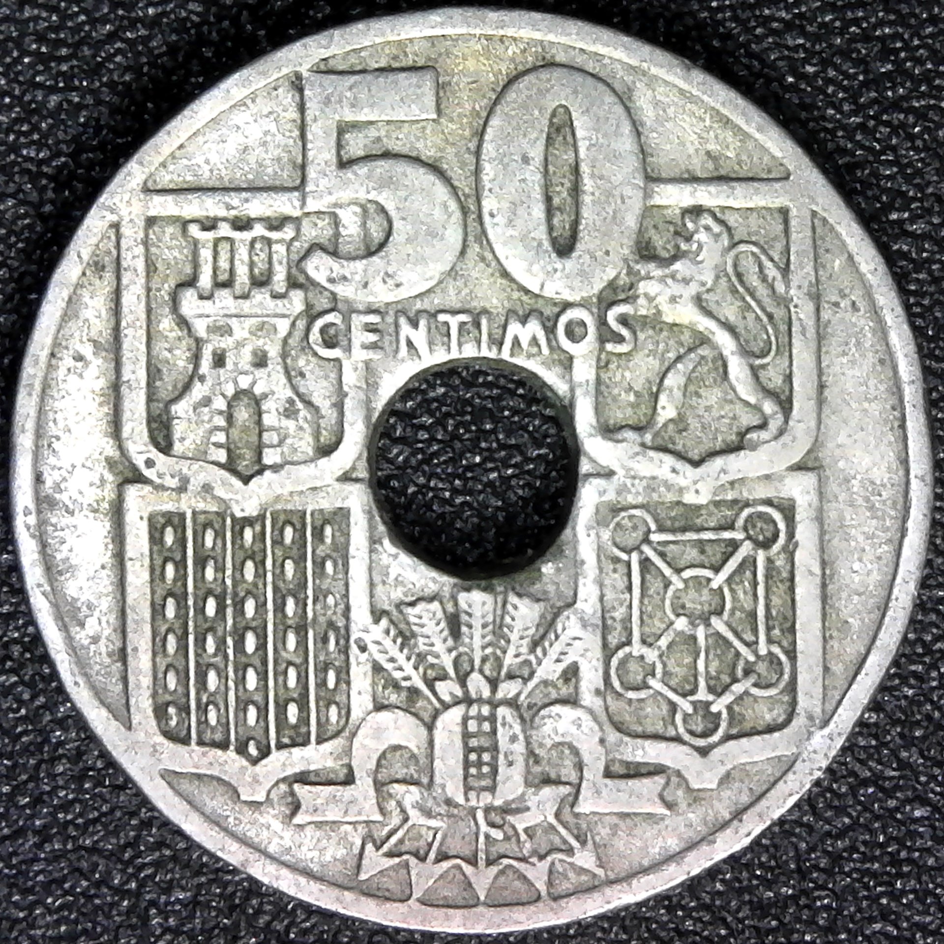 Spain 50 Centimos 1951 rev arrows down.jpg