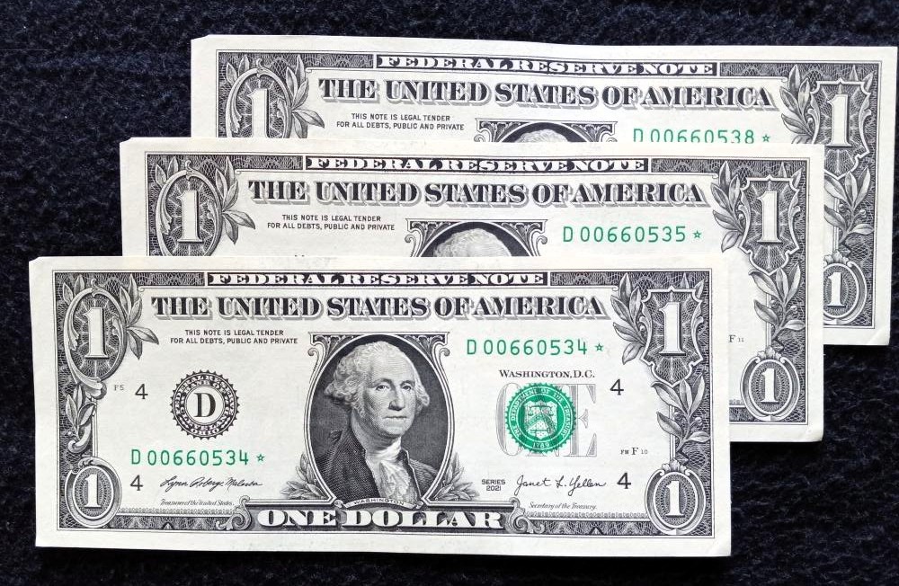 Three Mint Star notes cut error E.jpg
