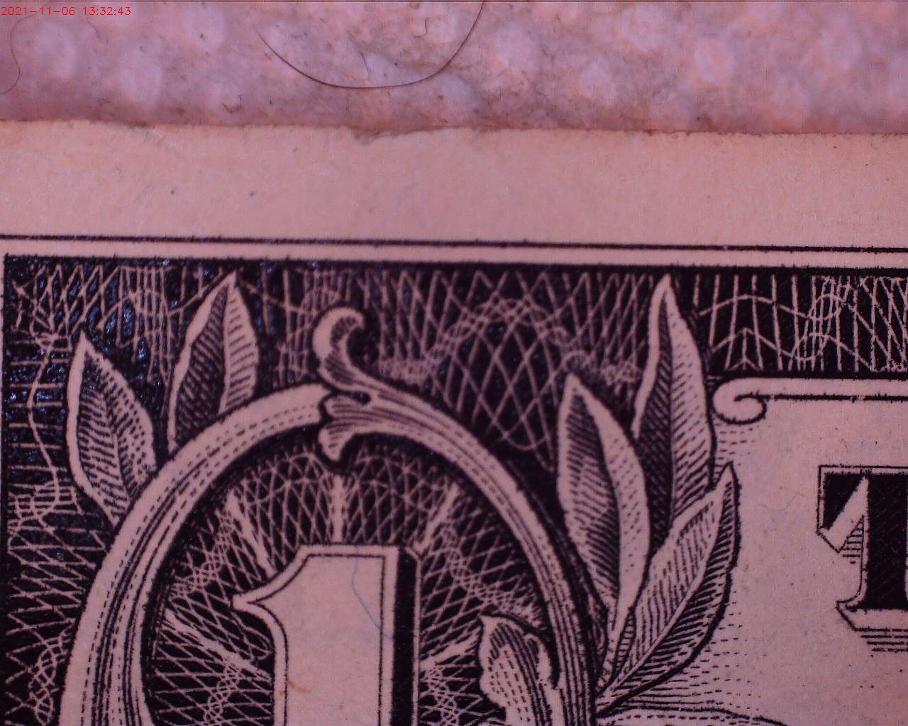 top left corner of dollar bill.jpg