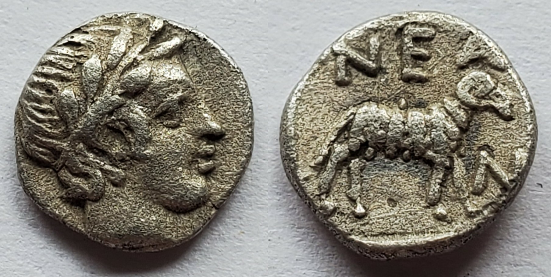 Troas neandria obol apollo ram.jpg