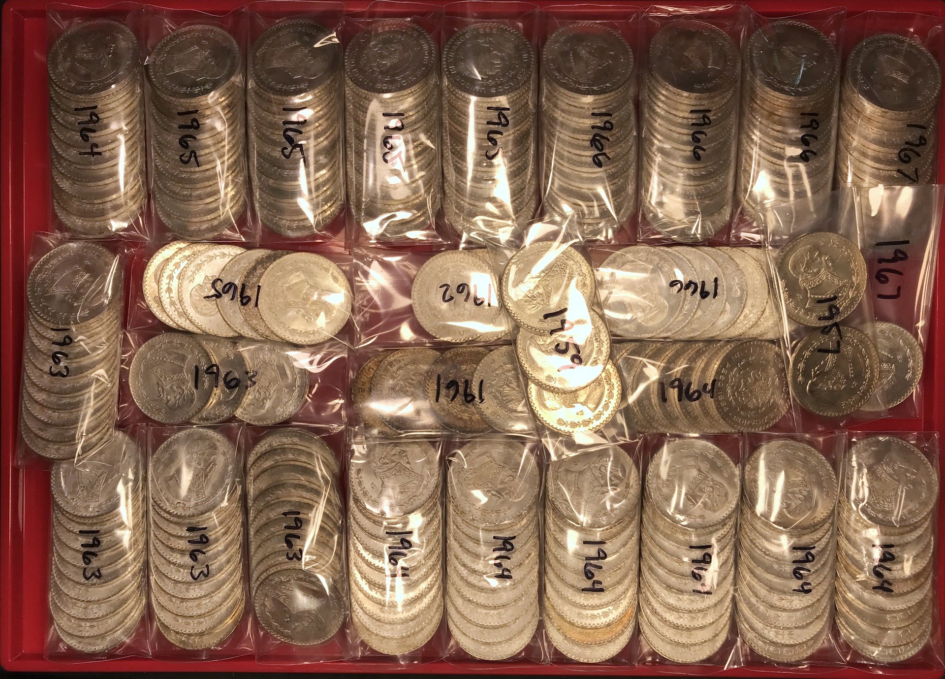 UNC Silver Mexican Pesos.JPG