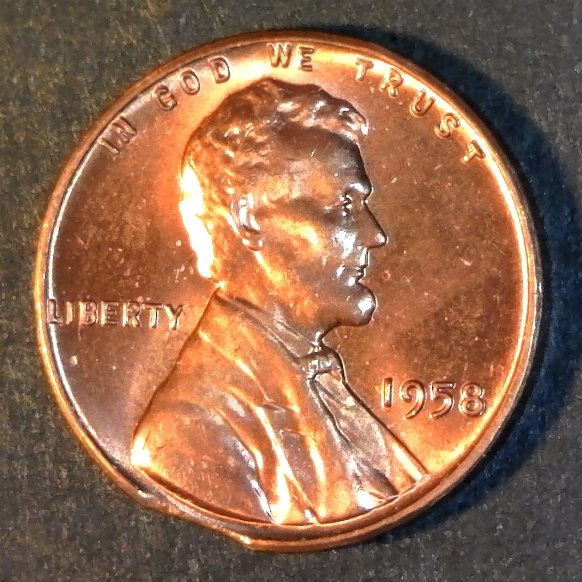 United States 1958 Cent clipped obverse 60pct.jpg