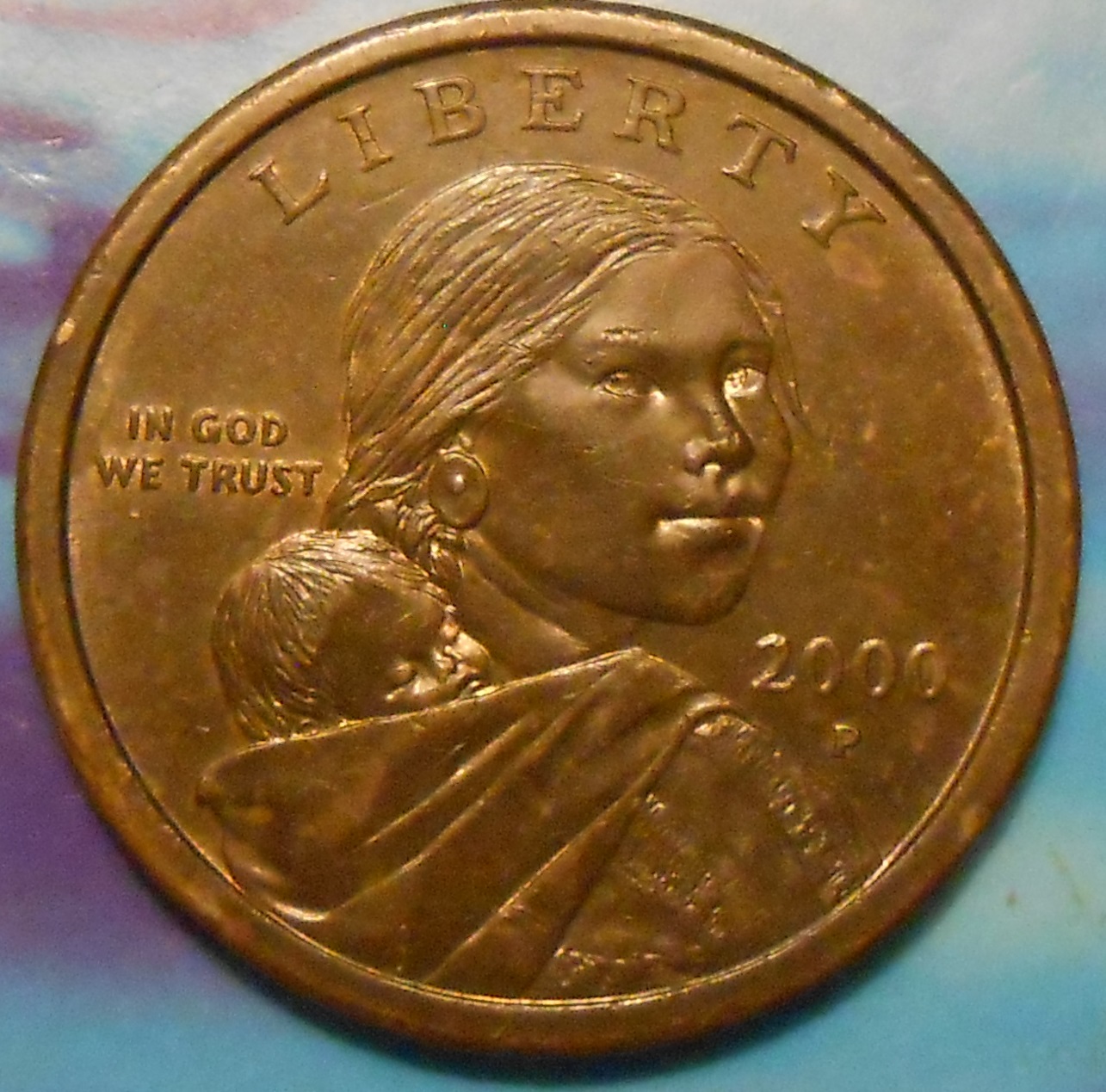unusual damaged coinstonedsacdollar.jpg