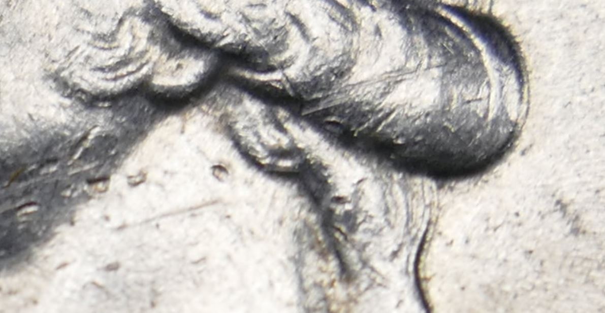 weird mark on 1976 quarter.JPG