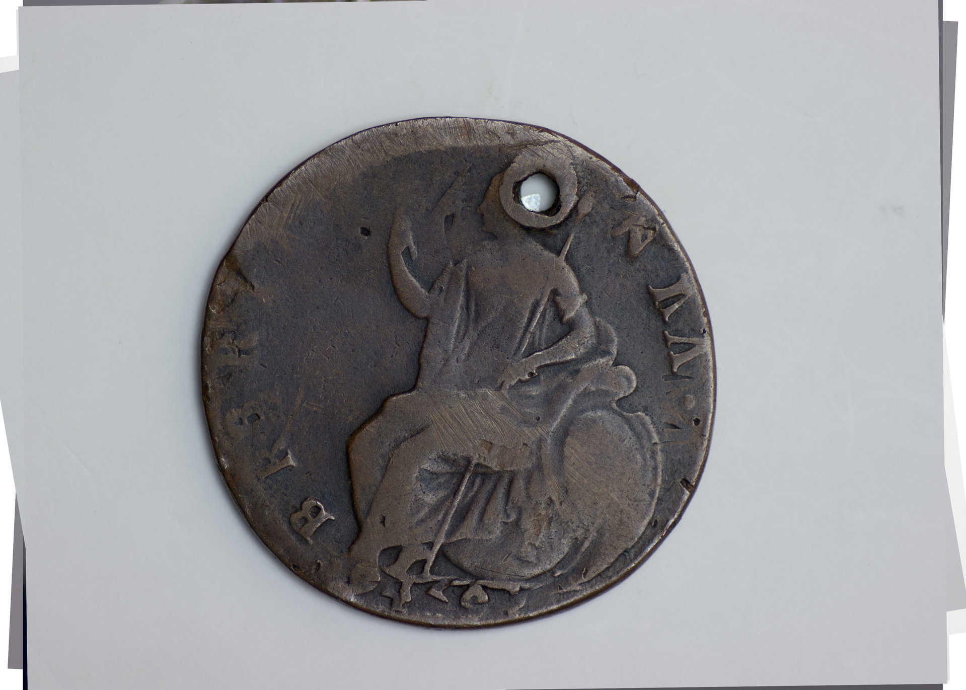 william and mary holed coin brittania side.jpg