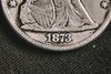 1873-S_Liberty_Seated_Dollar_Date_Detail-squashed.jpeg