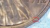 0537ee_die scratches below right bust.jpg