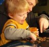 Dad n Rory lookin at coins (3) - Copy.JPG