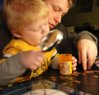 Dad n Rory lookin at coins (4) - Copy.JPG