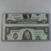 mis-cut 2dollar bill.jpg