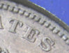 1900 O Morgan 004 edge doubling above the word states.jpg
