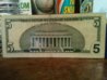 laminated $5 003.jpg