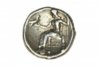 831042-greek-silver-tetradrachm-coin-from-alexander-the-great-showing-a-seated-hercules-dated-33.jpg