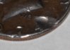 Angle Obverse 74 damage.jpg