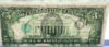 $5 bill against window.jpg